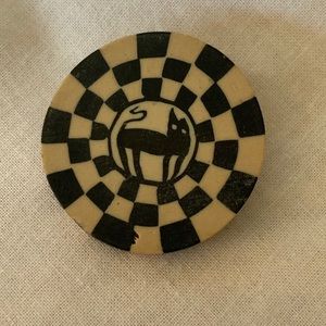 Circle pin with checks & a black cat